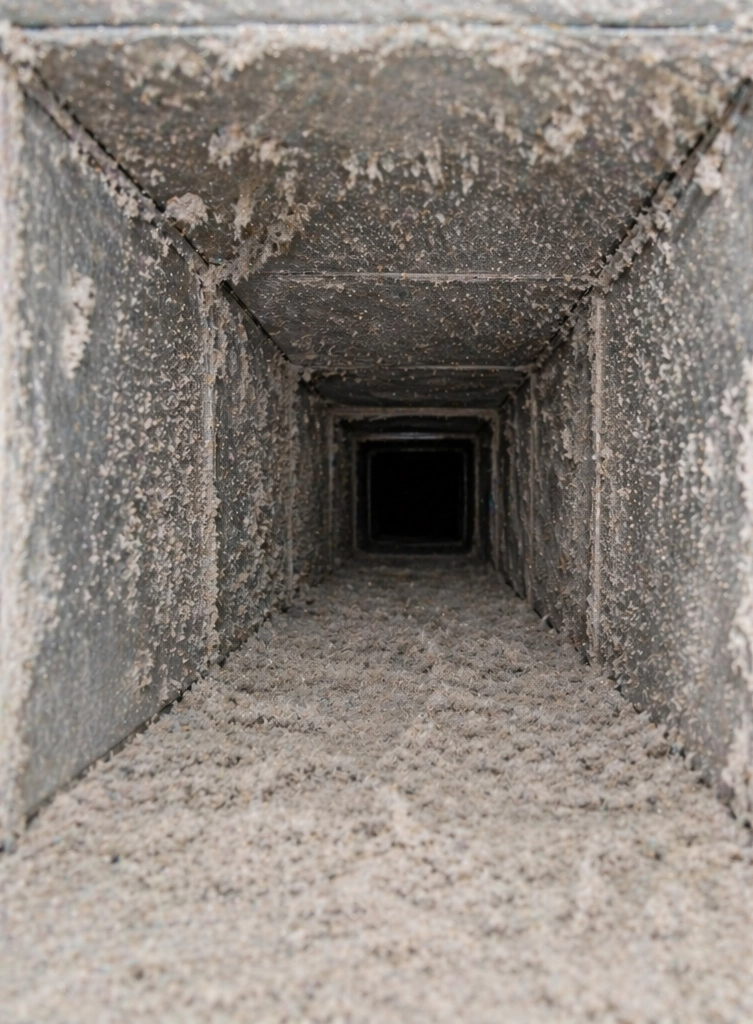 Dirty air duct before professional cleaning service